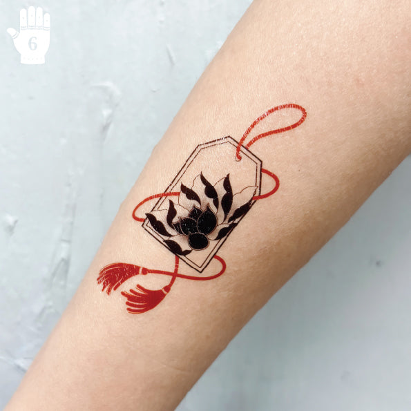 Temporary tattoo model - Lotus Omamori tattoo