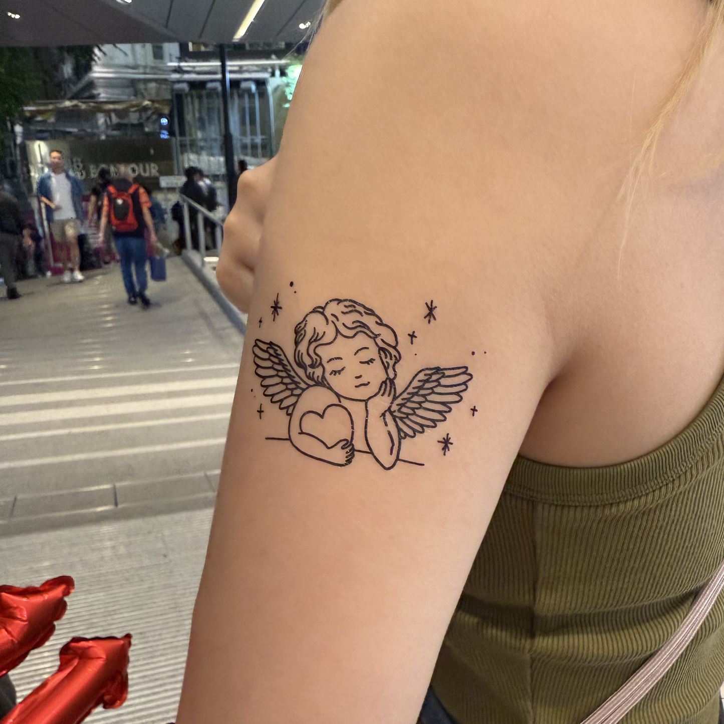 Temporary tattoo model - Cupid tattoo